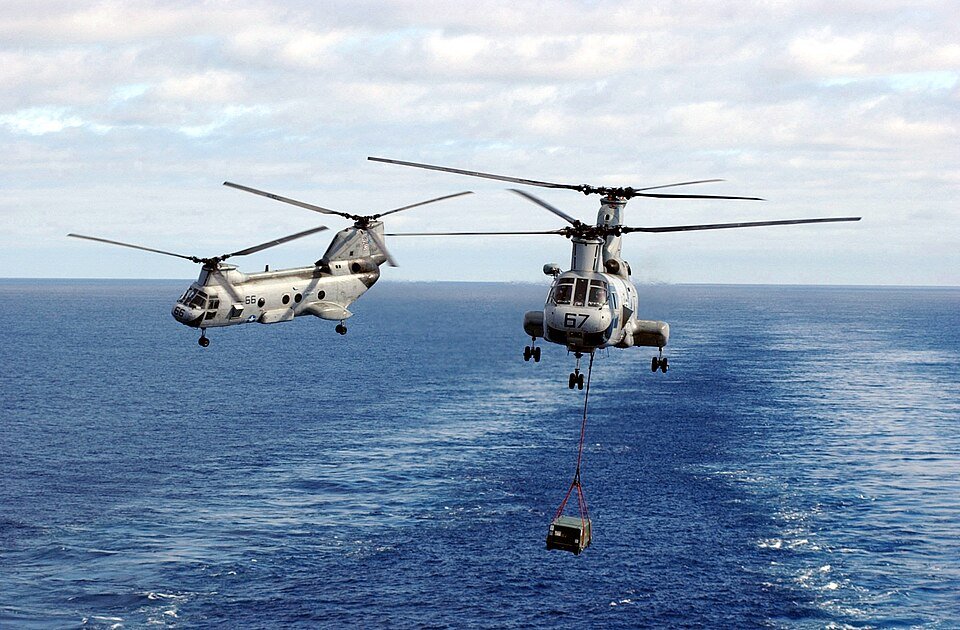Us Navy 030120-N-3241H-004 Helicopter Transfer Crates Of Supplies From Aboard Uss Sacramento